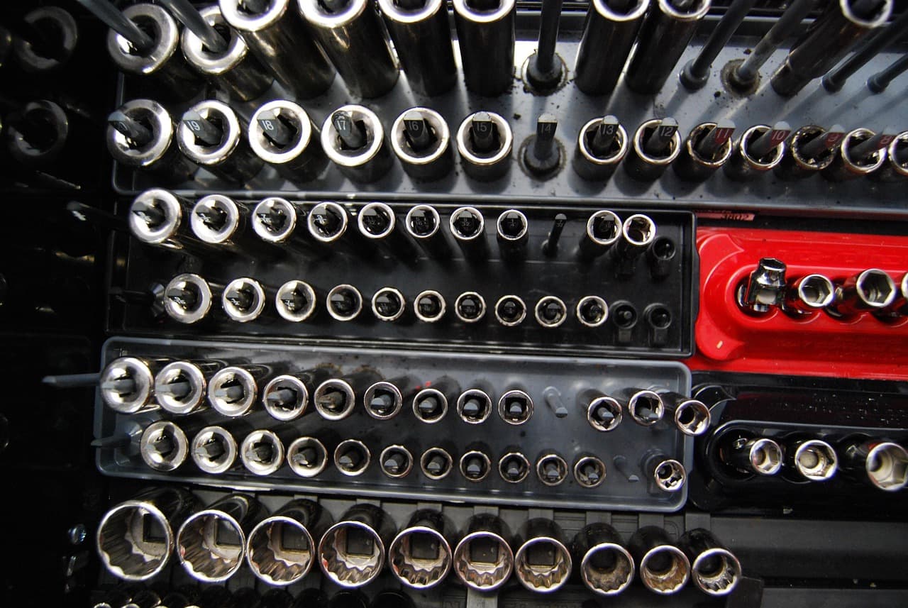 Rows of sockets racked on a workshop tool board